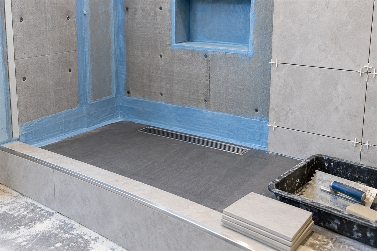 Shower waterproofing and tile preparation in progress